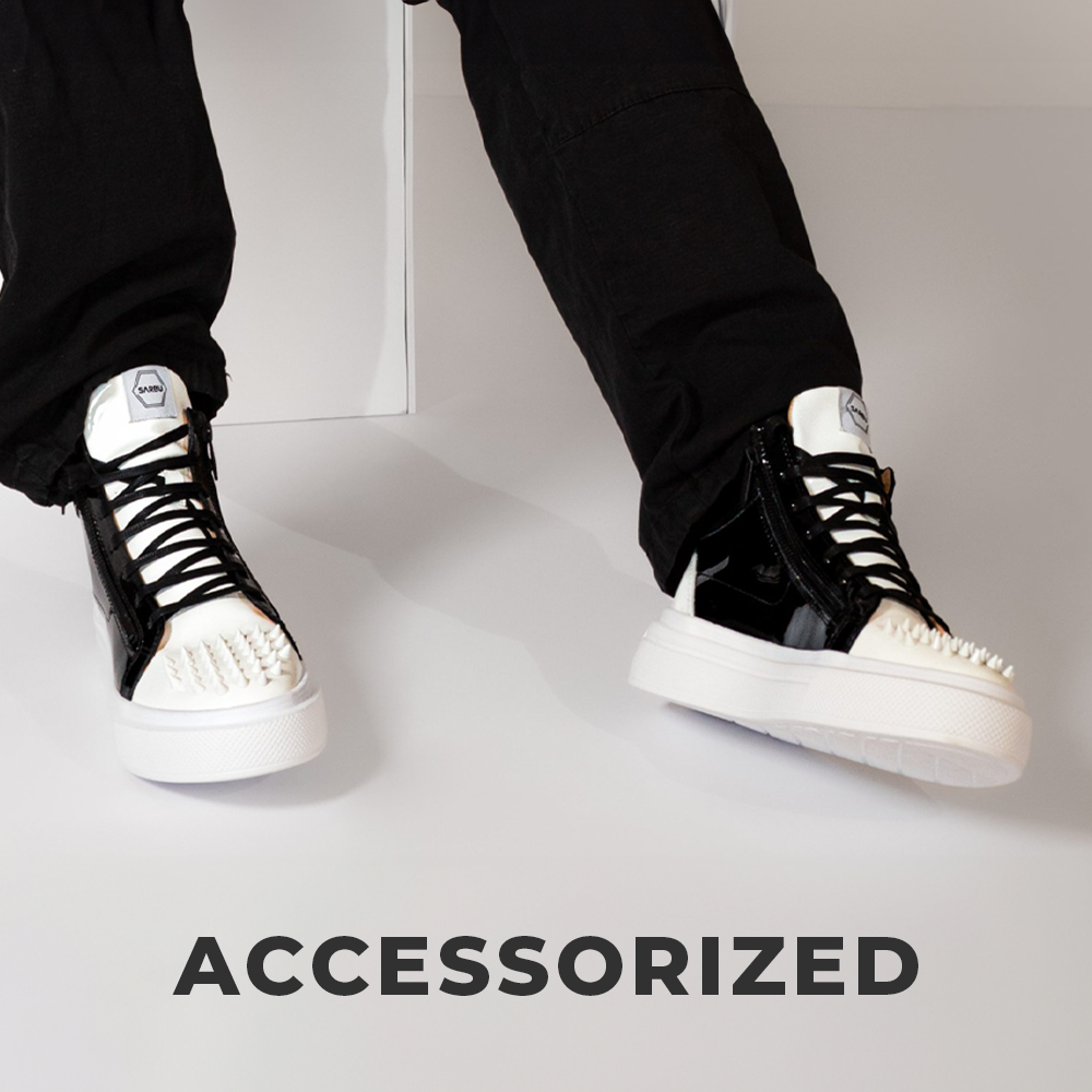 Give your shoes a shot of personality.
Colorful plain leather and python textured leather.
Sneackers accessorized with large studs on the front and back.